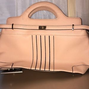 Pink and black purse